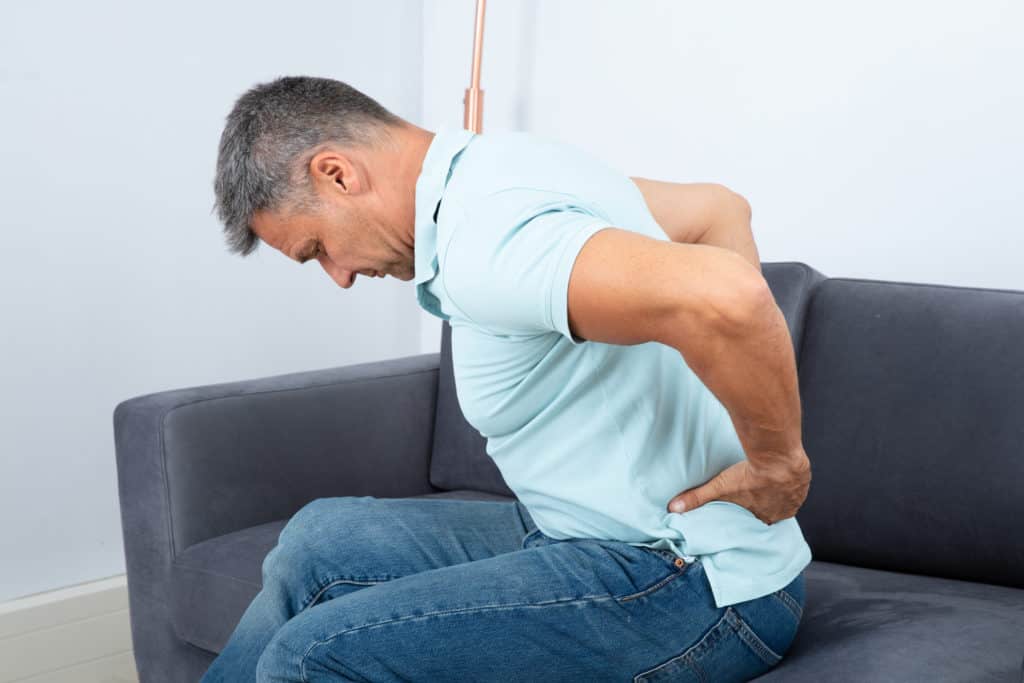 older man experiencing pain older man experiencing pain
